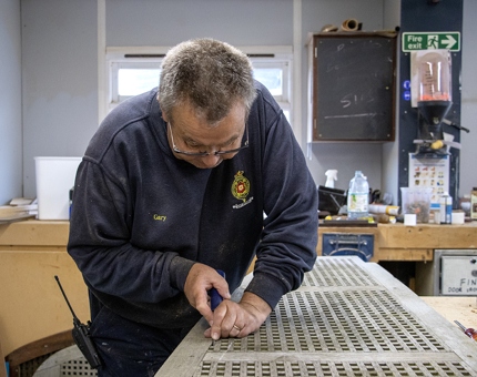 A closer look at the repair of the deck boards. 