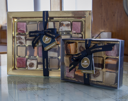 A large and small selection box of fudge. 