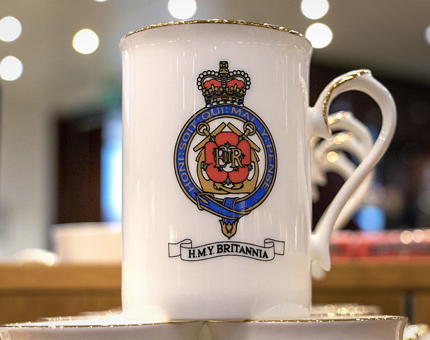 A Royal Yacht Britannia crested mug.