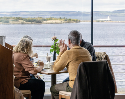 Visitors take in beautiful views across the Port of Leith and beyond to Fife.