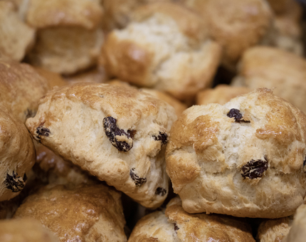 A pile of freshly baked fruit scones.