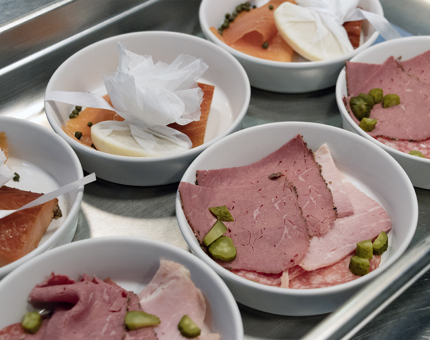 Plates of fish and meat starters. 
