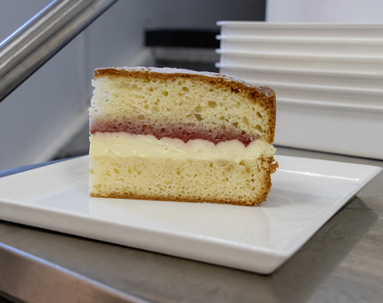 A slice of Victoria sponge cake.