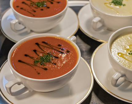 Different flavoured bowls of soups. 