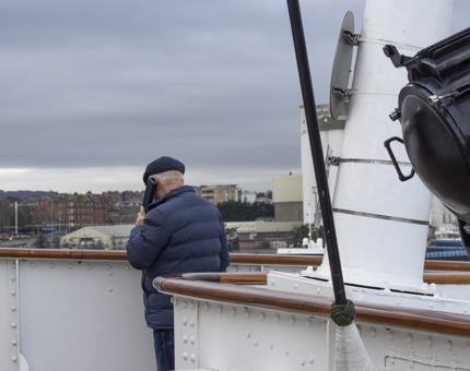 Visitor looks down from the Bridge deck