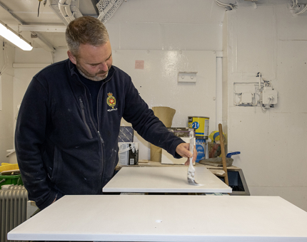 Painting panels white.