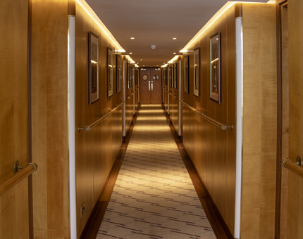 Golden lit corridor.