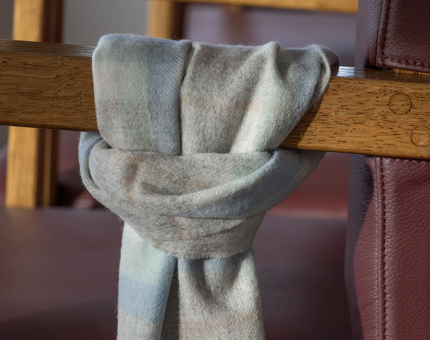 A pale scarf tied up 