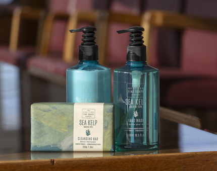 Scottish Fine Soaps luxury products including a soap bar, hand lotion and hand wash.