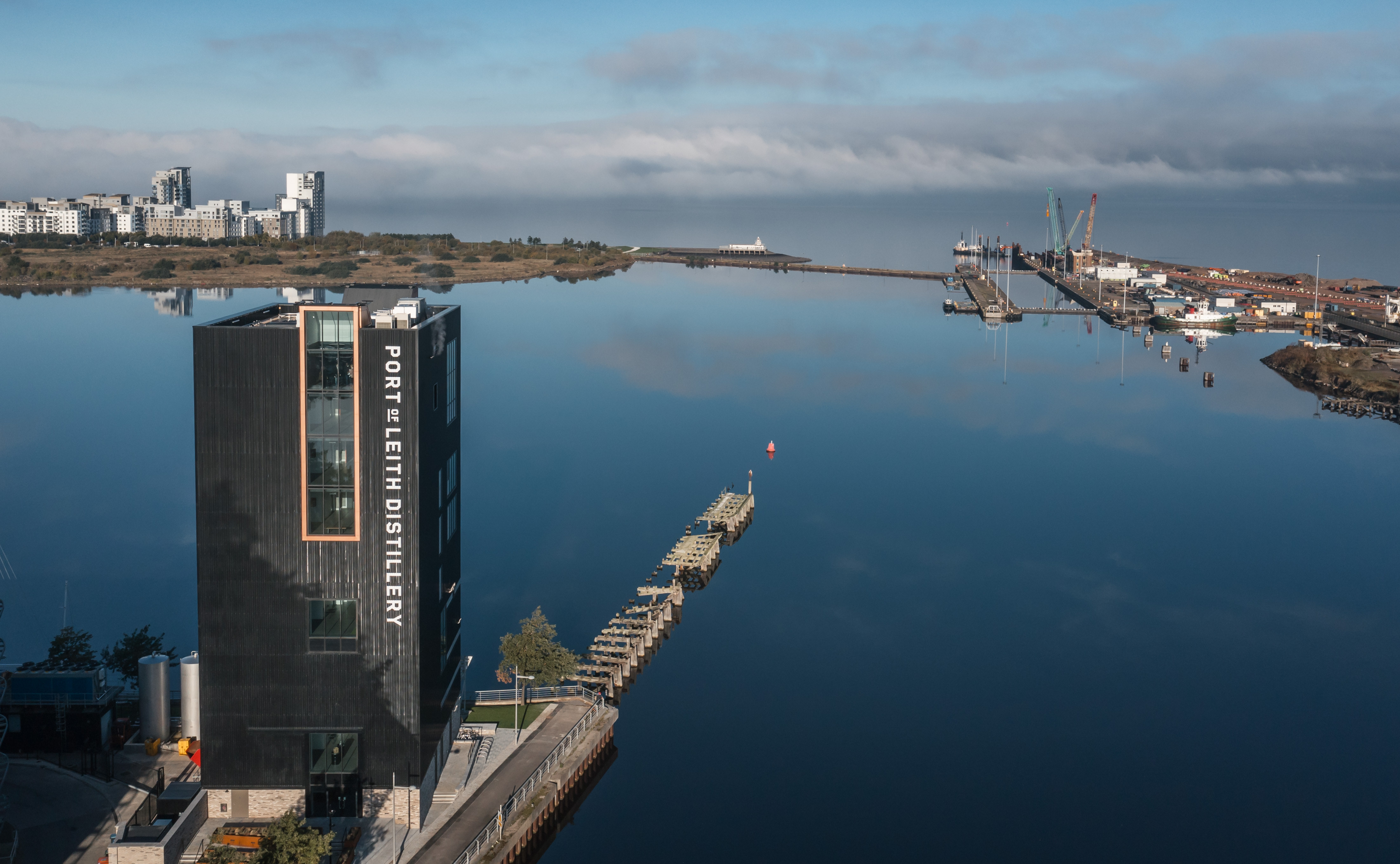 Port of Leith Distillery in Edinburgh. It is a vertical distillery next to the water.