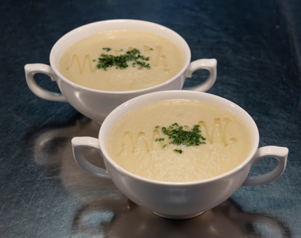 Two bowls of Cullen Skink soup.