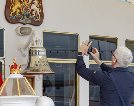 Visitor taking a picture on the Verandah Deck
