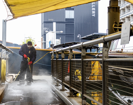 Power washing beside the Royal Barge