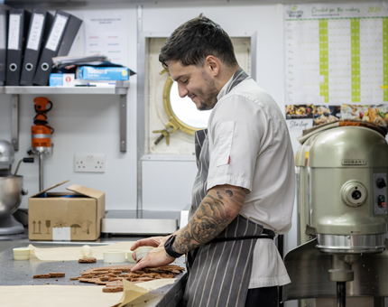 8. A chef in the Pastry Galley is creating a chocolate dessert..jpg