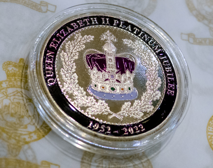 A Platinum Jubilee coin from the Gift Shop. 