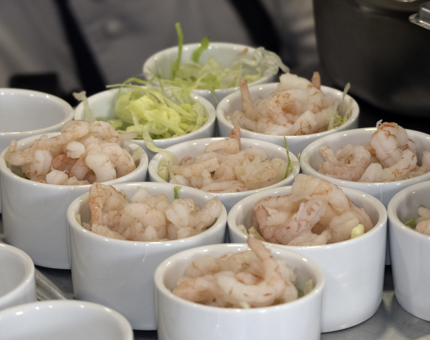 Dishes containing prawn cocktail. 