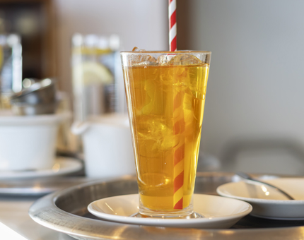 A tall glass of iced tea.