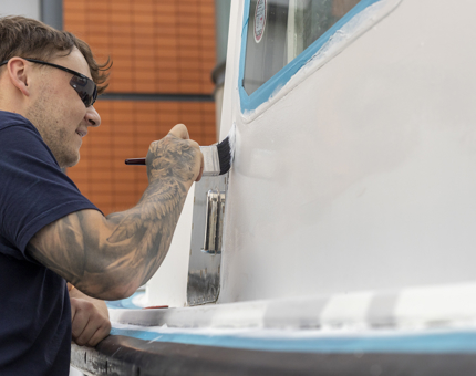A close-up of the Activity Boat painting.