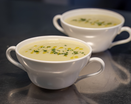 Two bowls of cullen skink soup.