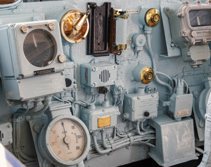 A detailed image of the dials and gauges on the Bridge panel.