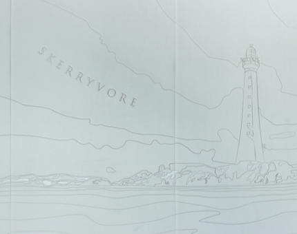A grey emroidered image of a lighthouse and the words Skerryvore. 