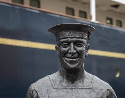 A statue of the longest serving Royal Yachtsman Ellis 'Norrie' Norrell MVO RVM