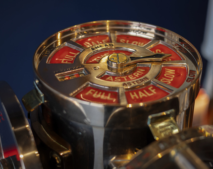 A closeup of a ships engine order dial.