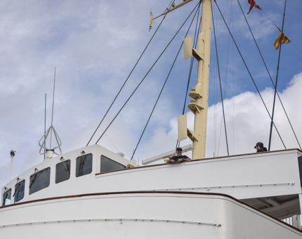 A close up of Britannia's Bridge in Leith, there are two people on it. 