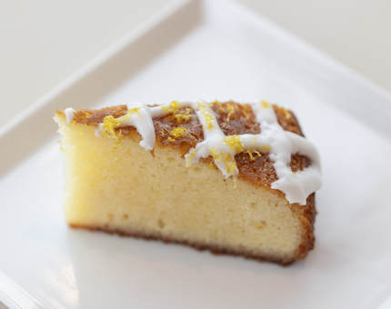A slice of lemon drizzle cake.