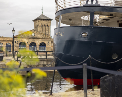 The Aft of Fingal. There is a building in the background. 
