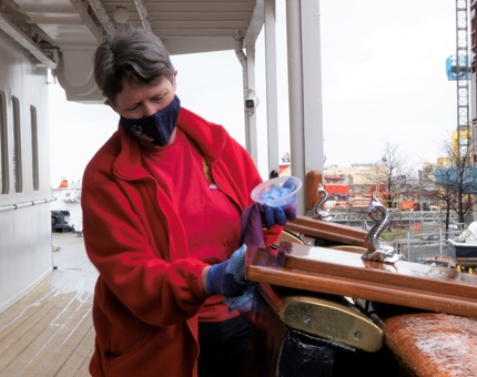 Carol, Housekeeping Team Leader, polishes at the top of the Royal Brow.