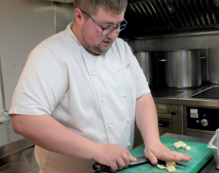 Preparing garlic in the Galley.