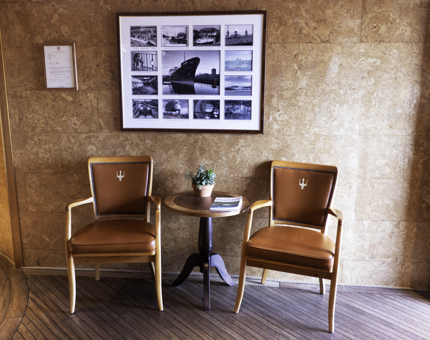 Fingal's Reception with chairs, a table and a photo collage of images of Fingal. 
