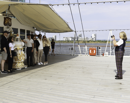 Visitor Assistant taking a photograph