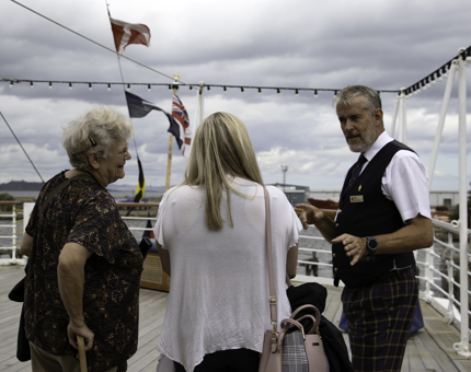 Visitor Assistant chatting to visitors