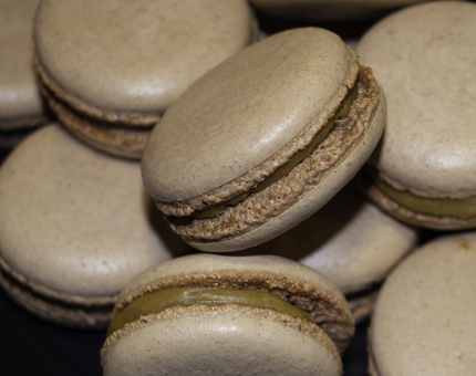 Close-up view of salted caramel macarons.