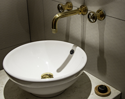 A detail of the washbasin inside a cabin bathroom at Fingal. 