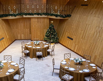 The Ballroom at Fingal with a Christmas tree and garlands decorating the gallery. 