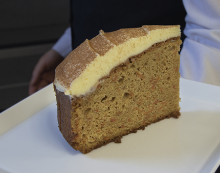 A large slice of carrot cake.