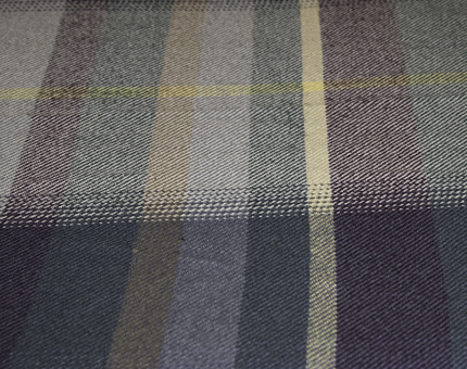 A close-up of the Araminta Campbell tartan bed runner. 