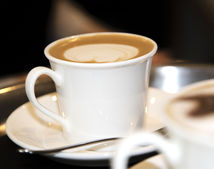 A close-up of a coffee in a mug. 