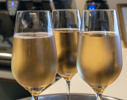 A close-up of two glasses of Britannia Rosé. 