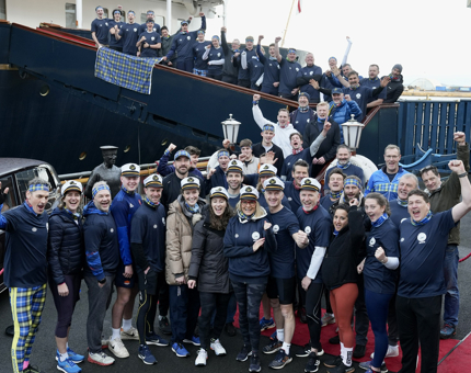 The group of celebrity rowers pose on the Royal Brow and Quayside at The Royal Yacht Britannia. 