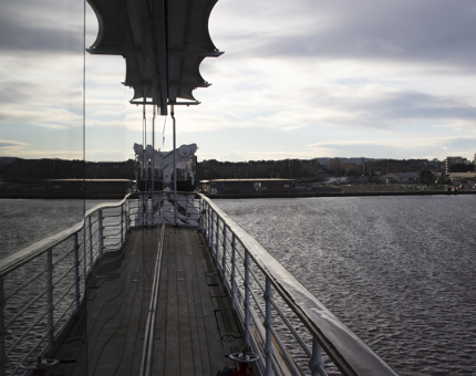 The reflection on the glass windows outside the Royal Deck Tea Room showing the waves in the water. 