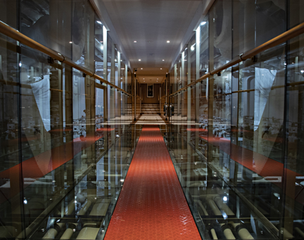 Inside the walk-through Engine Room at Fingal. Guests can walk along a red floor which is above the Engine Room.