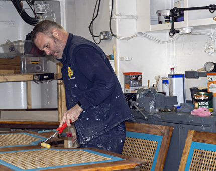 Jos varnishing the top of a rope box from the Bridge.