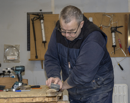 Gary sanding the newly manufactured spare set of handrails for Fingal’s emergency gangway.