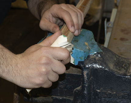 A closer look at the work on the boat hooks. 