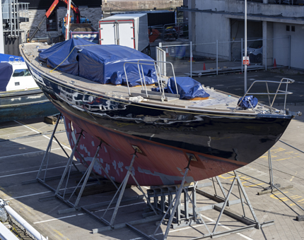 Bloodhound sitting on supports outside the compound of Britannia with tarpaulin covering the top. 