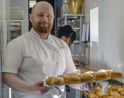 Pawel, X, with freshly baked scones, perfect for a mid-morning stop during your tour.